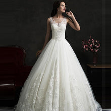 Load image into Gallery viewer, Fabulous Fall A-Line Wedding Gown With Sheer Boat Neck Illusion Buttons Back Lace Appliques And Chapel Train - A Thrifty Bride Shop
