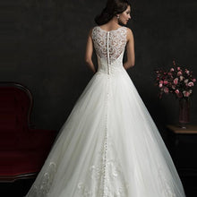 Load image into Gallery viewer, Fabulous Fall A-Line Wedding Gown With Sheer Boat Neck Illusion Buttons Back Lace Appliques And Chapel Train - A Thrifty Bride Shop