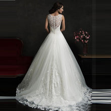 Load image into Gallery viewer, Fabulous Fall A-Line Wedding Gown With Sheer Boat Neck Illusion Buttons Back Lace Appliques And Chapel Train - A Thrifty Bride Shop