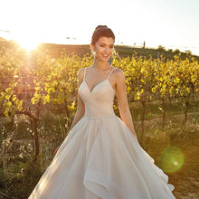 Load image into Gallery viewer, Spaghetti Straps And Tiered Ruffles Flowing Sweep Train Are The Feature Of This Beautiful Dress - A Thrifty Bride Shop
