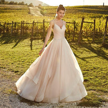 Load image into Gallery viewer, Spaghetti Straps And Tiered Ruffles Flowing Sweep Train Are The Feature Of This Beautiful Dress - A Thrifty Bride Shop