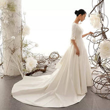 Load image into Gallery viewer, Vintage Inspired Matted Satin Wedding Dress With Big Bow Elegant Awe Inspiring