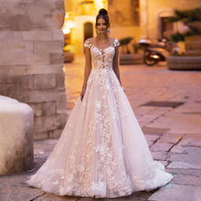 Load image into Gallery viewer, Stunning Backless Wedding Dress With A-line Bodice Cap Sleeves And 3D Appliques Features Tulle And Lace Beading On Plush Skirt