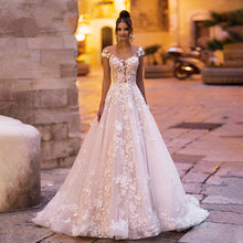 Load image into Gallery viewer, Stunning Backless Wedding Dress With A-line Bodice Cap Sleeves And 3D Appliques Features Tulle And Lace Beading On Plush Skirt